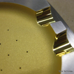A diffused high efficiency Laser Gold meant to create a Lambertian effect in the cup of the device.